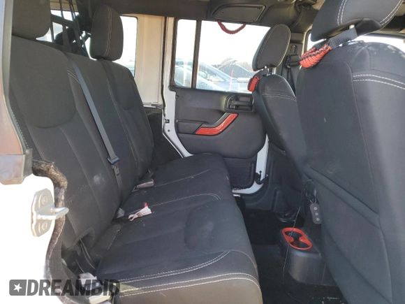 2016 Jeep Wrangler Unlimited Rubicon Hard Rock with VIN 1C4BJWFG2GL243895, listed as a Copart auction lot 84698754 with 0 mi miles and Non Repairable. Bid and sale history available at carsss.com. Image 12.