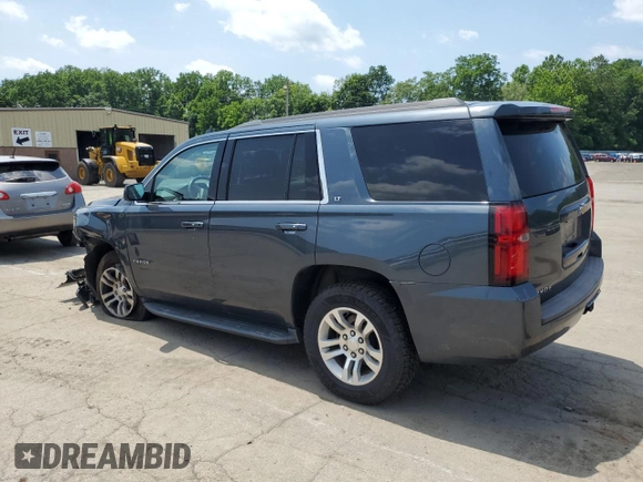 2020 Chevrolet Tahoe LT with VIN 1GNSKBKC0LR260766, listed as a Copart auction lot 61465725 with 104,850 mi miles and Salvage title. Bid and sale history available at DreamBid. Image 2.