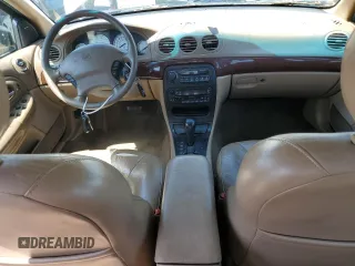 1999 Chrysler 300M M z VIN 2C3HE66G3XH570094, wystawiony jako Copart lot #56068465 z przebiegiem 186 011 mil mil oraz Tytuł czysty. Historia ofert i sprzedaży dostępna na DreamBid. Obrazek 8.