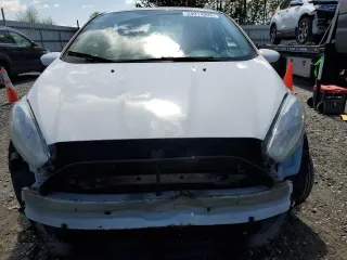 2018 Ford Fiesta SE z VIN 3FADP4BJ7JM114172, wystawiony jako Copart lot #54014805 z przebiegiem 66 828 mil mil oraz Szkoda całkowita • Salvage title. Historia ofert i sprzedaży dostępna na DreamBid. Obrazek 5.