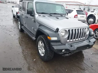 2018 Jeep Wrangler Unlimited Sport S with VIN 1C4HJXDG7JW136267, listed as a IAAI auction lot 41464461 with 125,553 mi miles. Bid and sale history available at carsss.com. Image 1.