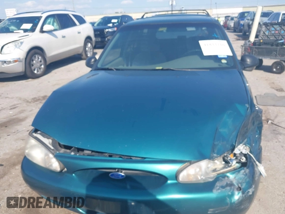 1997 Ford Escort LX z VIN 3FALP15P7VR158272, wystawiony jako IAAI lot #41833216 z przebiegiem 148 170 mil mil oraz . Historia ofert i sprzedaży dostępna na DreamBid. Obrazek 11.