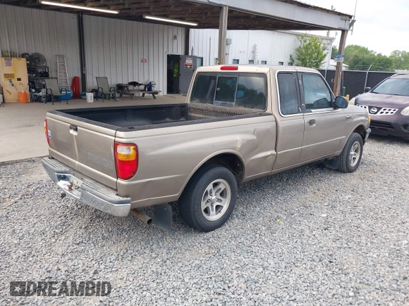 2003 Mazda B-Series 2WD Truck SE with VIN 4F4YR46VX3TM16294, listed as a IAAI auction lot 42034107 with 165,007 mi miles. Bid and sale history available at carsss.com. Image 4.