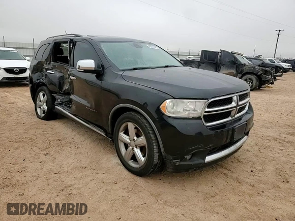 2012 Dodge Durango Citadel with VIN 1C4SDHET7CC180918, listed as a Copart auction lot 42714145 with 211,502 mi miles and Salvage title. Bid and sale history available at DreamBid. Image 12.