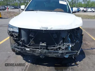 2015 Jeep Grand Cherokee Summit with VIN 1C4RJFJG1FC797711, listed as a IAAI auction lot 42026431 with 101,075 mi miles and . Bid and sale history available at DreamBid. Image 6.