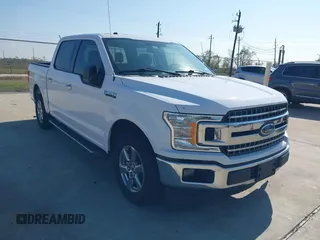 2018 Ford F-150 XL with VIN 1FTEW1C53JKF90380, listed as a IAAI auction lot 40941123 with 134,454 mi miles. Bid and sale history available at carsss.com. Image 1.