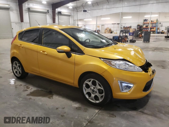 2011 Ford Fiesta SES with VIN 3FADP4FJ7BM114331, listed as a Copart auction lot 52442425 with 54,756 mi miles and Salvage Title. Bid and sale history available at carsss.com. Image 4.