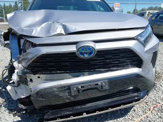 2022 Toyota RAV4 Hybrid SE with VIN 4T3T6RFV7NU100943, listed as a IAAI auction lot 42621376 with 22,543 mi miles and . Bid and sale history available at DreamBid. Image 20.