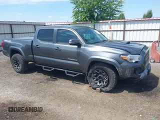 2017 Toyota Tacoma SR5 with VIN 3TMDZ5BN0HM032002, listed as a IAAI auction lot 42599281 with 119,601 mi miles and . Bid and sale history available at DreamBid. Image 1.