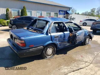 1989 Toyota Corolla z VIN 1NXAE92E2KZ028800, wystawiony jako Copart lot #74139934 z przebiegiem 78 479 mil mil oraz Nie do naprawy • Non repairable. Historia ofert i sprzedaży dostępna na DreamBid. Obrazek 3.