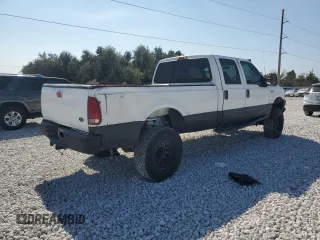 2000 Ford Super Duty F-250 XL with VIN 1FTNW21SXYEA52699, listed as a Copart auction lot 78659054 with 154,056 mi miles and Salvage Title. Bid and sale history available at carsss.com. Image 3.