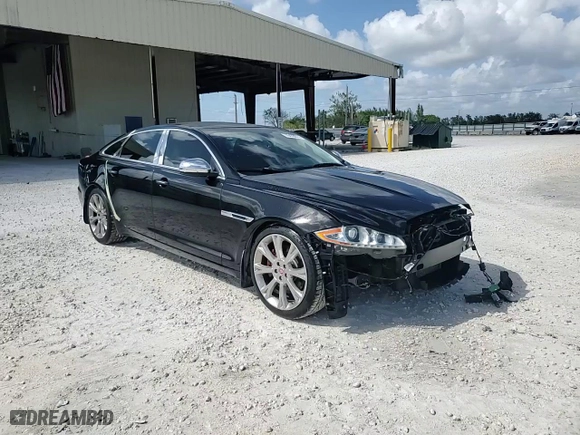 2014 Jaguar XJ with VIN SAJWA2GZ4E8V60864, listed as a Copart auction lot 76478674 with 50,578 mi miles and Salvage Title. Bid and sale history available at carsss.com. Image 13.
