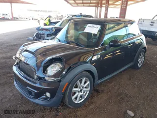 2013 MINI Cooper Hardtop S with VIN WMWSV3C5XDT480004, listed as a IAAI auction lot 41885248 with 148,419 mi miles. Bid and sale history available at carsss.com. Image 17.