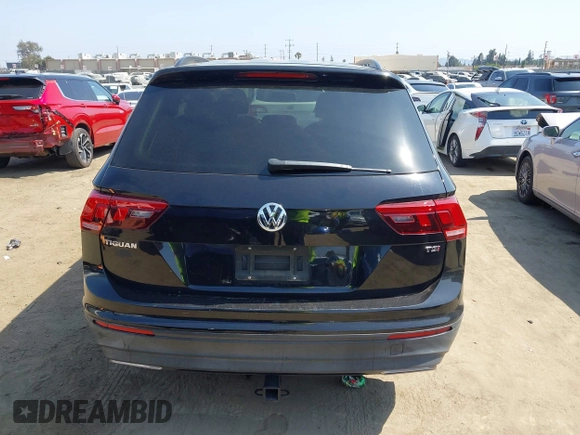 2018 Volkswagen Tiguan S with VIN 3VV1B7AX7JM092033, listed as a IAAI auction lot 42373619 with 124,775 mi miles and . Bid and sale history available at DreamBid. Image 16.