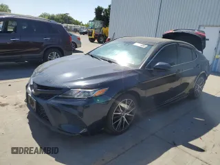 2018 Toyota Camry LE with VIN 4T1B11HKXJU597813, listed as a Copart auction lot 59144065 with 125,467 mi miles and Salvage title. Bid and sale history available at DreamBid. Image 1.