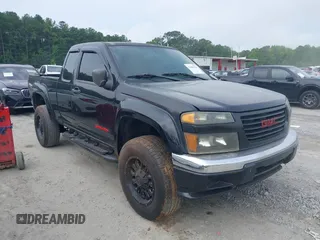 2004 GMC Canyon SLE Z71 z VIN 1GTDT196548169346, wystawiony jako IAAI lot #42482724 z przebiegiem 244 045 mil mil oraz . Historia ofert i sprzedaży dostępna na DreamBid. Obrazek 1.