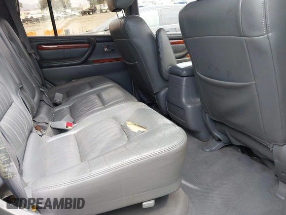 2001 Lexus LX 470 z VIN JTJHT00WX13509489, wystawiony jako IAAI lot #42227083 z przebiegiem 360 283 mil mil oraz . Historia ofert i sprzedaży dostępna na DreamBid. Obrazek 8.