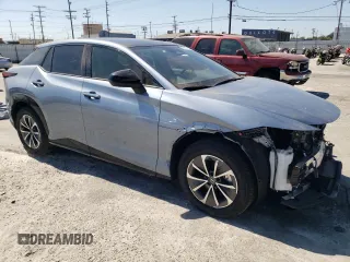 2023 Lexus RZ 450e Premium z VIN JTJAAAAB5PA017059, wystawiony jako Copart lot #48378775 z przebiegiem 11 182 mil mil oraz Szkoda całkowita • Salvage title. Historia ofert i sprzedaży dostępna na DreamBid. Obrazek 4.