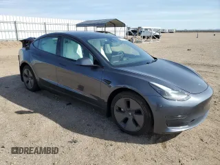 2023 Tesla Model 3 with VIN 5YJ3E1EA8PF648073, listed as a Copart auction lot 49284775 with 20,498 mi miles and Salvage Title. Bid and sale history available at DreamBid. Image 4.
