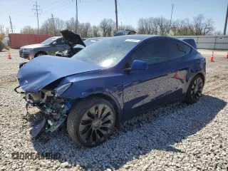 2022 Tesla Model Y Performance z VIN 7SAYGDEF2NF461103, wystawiony jako Copart lot #52198205 z przebiegiem 33 576 mil mil oraz Szkoda całkowita • Salvage title. Historia ofert i sprzedaży dostępna na DreamBid. Obrazek 1.