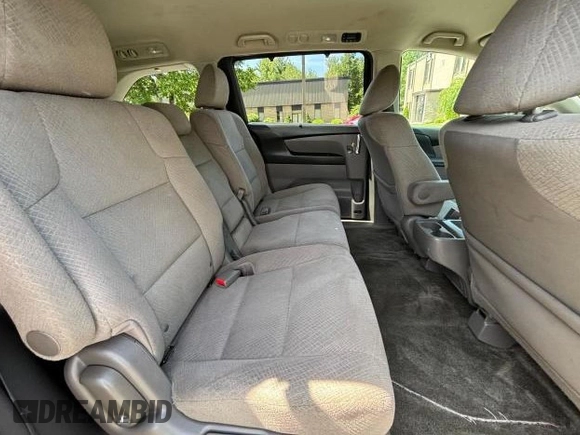 2015 Honda Odyssey EX z VIN 5FNRL5H41FB126137, wystawiony jako Copart lot #61684655 z przebiegiem 54 551 mil mil oraz Czysty tytuł • Clean title. Historia ofert i sprzedaży dostępna na DreamBid. Obrazek 6.