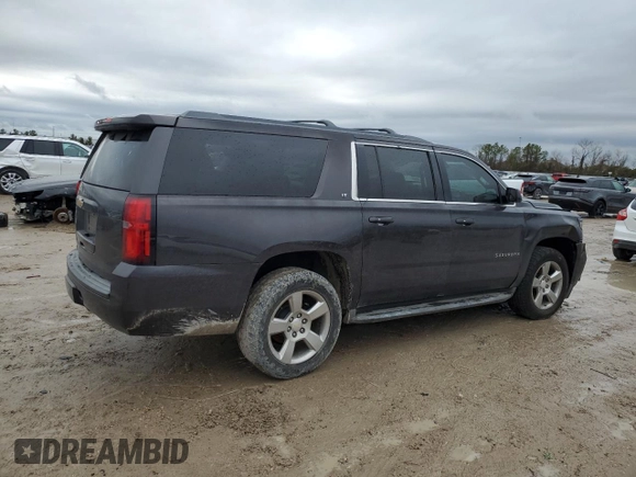 2015 Chevrolet Suburban LT with VIN 1GNSCJKC1FR159411, listed as a Copart auction lot 52169465 with 145,511 mi miles and Salvage title. Bid and sale history available at DreamBid. Image 3.