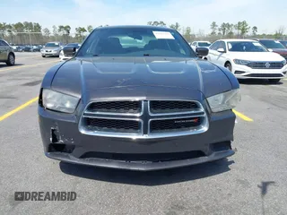 2014 Dodge Charger SE with VIN 2C3CDXBG0EH216023, listed as a IAAI auction lot 41827307 with 243,107 mi miles. Bid and sale history available at carsss.com. Image 12.