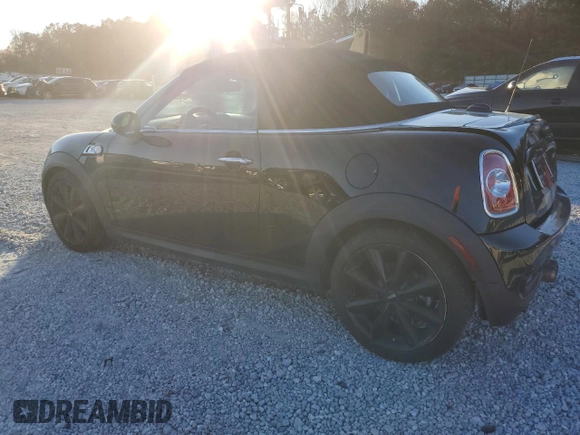 2012 MINI Roadster S z VIN WMWSY3C51CT565240, wystawiony jako Copart lot #83651954 z przebiegiem 172 954 mil mil oraz Szkody całkowita. Historia ofert i sprzedaży dostępna na DreamBid. Obrazek 2.
