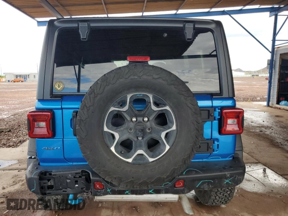 2023 Jeep Wrangler Rubicon with VIN 1C4JJXR69PW581362, listed as a Copart auction lot 58557795 with 34,357 mi miles and Salvage title. Bid and sale history available at DreamBid. Image 6.