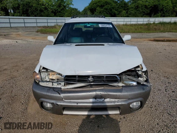 1999 Subaru Legacy Outback with VIN 4S3BG6850X7649578, listed as a Copart auction lot 56654155 with 174,651 mi miles and Salvage title. Bid and sale history available at DreamBid. Image 5.
