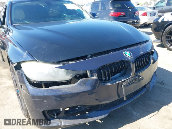 2015 BMW 3 Series 328i with VIN WBA3C1C50FK124300, listed as a IAAI auction lot 40112372 with 142,591 mi miles and . Bid and sale history available at carsss.com. Image 6.
