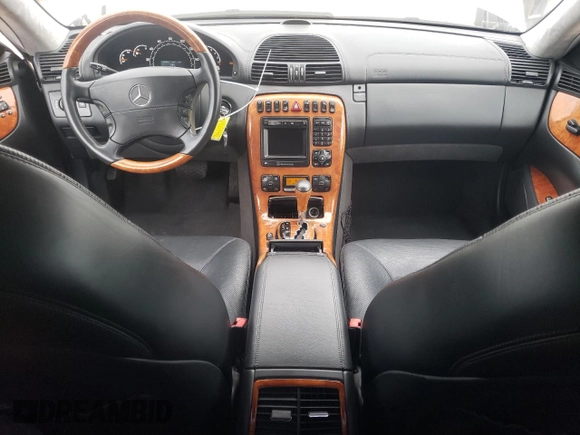 2001 Mercedes-Benz CL 500/600 with VIN WDBPJ78J41A016004, listed as a Copart auction lot 50155355 with 75,051 mi miles and Salvage Title. Bid and sale history available at DreamBid. Image 8.
