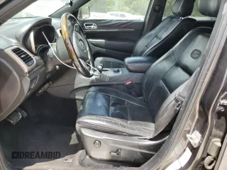 2014 Jeep Grand Cherokee Overland with VIN 1C4RJFCT7EC182234, listed as a Copart auction lot 54754465 with 185,658 mi miles and Salvage Title. Bid and sale history available at DreamBid. Image 7.