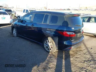 2014 Mazda 5 Grand Touring z VIN JM1CW2DL7E0175624, wystawiony jako IAAI lot #41469852 z przebiegiem 118 698 mil mil oraz . Historia ofert i sprzedaży dostępna na DreamBid. Obrazek 3.