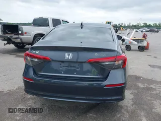 2023 Honda Civic EX with VIN 2HGFE1F73PH312228, listed as a IAAI auction lot 42185408 with 19,339 mi miles and . Bid and sale history available at DreamBid. Image 16.