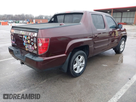 2009 Honda Ridgeline RTL with VIN 5FPYK16529B100032, listed as a IAAI auction lot 41206781 with 130,694 mi miles and . Bid and sale history available at DreamBid. Image 4.