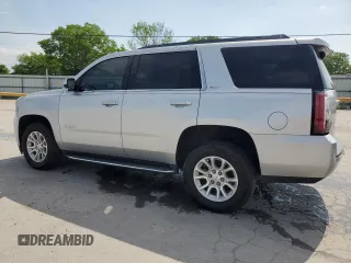 2017 GMC Yukon SLT z VIN 1GKS1BKC4HR375877, wystawiony jako Copart lot #55150545 z przebiegiem 144 788 mil mil oraz Szkoda całkowita • Salvage title. Historia ofert i sprzedaży dostępna na DreamBid. Obrazek 2.