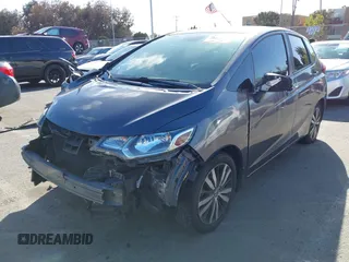 2015 Honda Fit EX-L z VIN 3HGGK5H89FM774299, wystawiony jako IAAI lot #41793448 z przebiegiem 142 228 mil mil oraz . Historia ofert i sprzedaży dostępna na DreamBid. Obrazek 17.