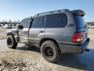 2006 Lexus LX 470 z VIN JTJHT00W664007502, wystawiony jako Copart lot #47871885 z przebiegiem 172 552 mil mil oraz Szkoda całkowita • Salvage title. Historia ofert i sprzedaży dostępna na DreamBid. Obrazek 2.