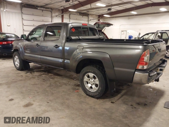 2013 Toyota Tacoma with VIN 3TMMU4FN9DM052987, listed as a IAAI auction lot 42325979 with 200,379 mi miles and . Bid and sale history available at DreamBid. Image 3.