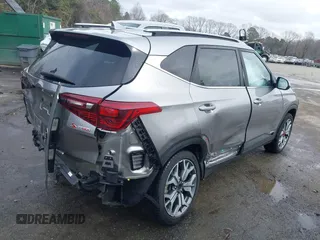 2021 Kia Seltos S with VIN KNDEUCA21M7087996, listed as a IAAI auction lot 41582039 with 59,644 mi miles. Bid and sale history available at carsss.com. Image 4.