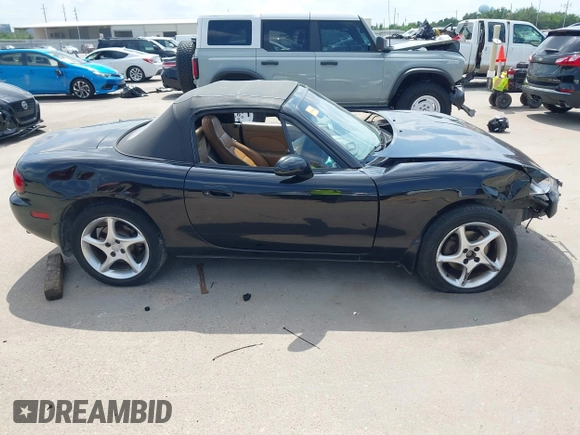 2002 Mazda MX-5 Miata Cloth with VIN JM1NB353520221312, listed as a IAAI auction lot 42410028 with 99,375 mi miles and . Bid and sale history available at DreamBid. Image 14.