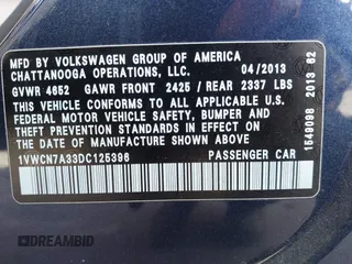 2013 Volkswagen Passat TDI SEL Premium with VIN 1VWCN7A33DC125396, listed as a IAAI auction lot 41862605 with 123,542 mi miles. Bid and sale history available at carsss.com. Image 9.