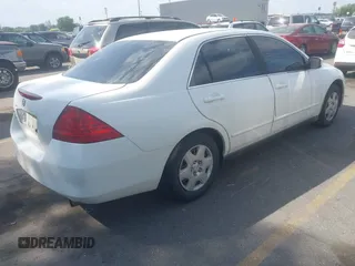 2007 Honda Accord LX with VIN 1HGCM56457A039536, listed as a IAAI auction lot 42640467 with 303,475 mi miles and . Bid and sale history available at DreamBid. Image 4.