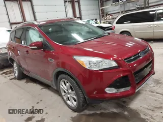 2014 Ford Escape Titanium with VIN 1FMCU9J9XEUA51732, listed as a IAAI auction lot 41542867 with 44,141 mi miles. Bid and sale history available at carsss.com. Image 1.