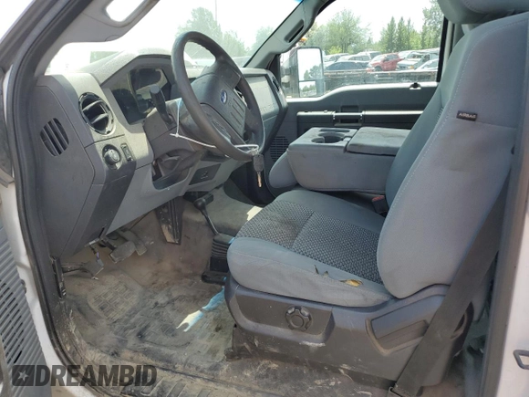 2014 Ford F-250 XL with VIN 1FTBF2B61EEB69314, listed as a Copart auction lot 57801965 with 165,016 mi miles and Salvage title. Bid and sale history available at DreamBid. Image 7.