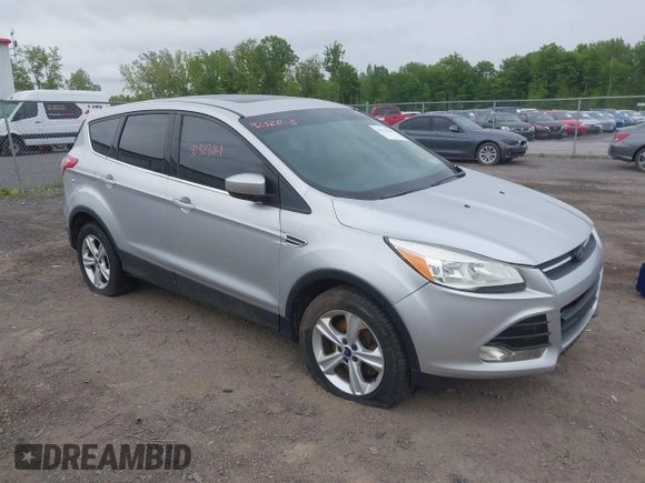 2014 Ford Escape SE z VIN 1FMCU9GX9EUC35713, wystawiony jako IAAI lot #42323161 z przebiegiem 169 393 mil mil oraz . Historia ofert i sprzedaży dostępna na DreamBid. Obrazek 1.