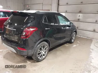 2018 Buick Encore Sport Touring with VIN KL4CJ1SB8JB610453, listed as a IAAI auction lot 41706318 with 127,960 mi miles. Bid and sale history available at carsss.com. Image 4.