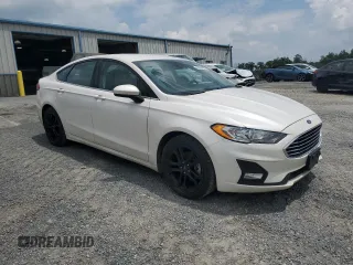 2020 Ford Fusion SE with VIN 3FA6P0HD1LR119649, listed as a Copart auction lot 63858665 with 133,344 mi miles and Clean title. Bid and sale history available at DreamBid. Image 4.