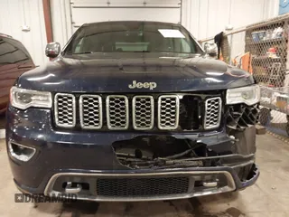 2017 Jeep Grand Cherokee Overland with VIN 1C4RJFCG3HC693897, listed as a IAAI auction lot 41636323 with 105,575 mi miles. Bid and sale history available at carsss.com. Image 13.